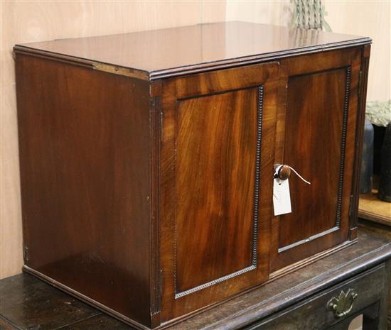 A Victorian mahogany two door wall cupboard W.61cm